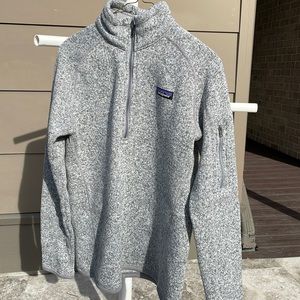 Women’s size medium Patagonia quarter zip jacket.
